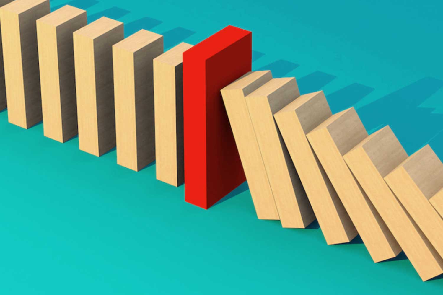 An illustration of beige dominoes falling against a larger red domino, blocking their path.