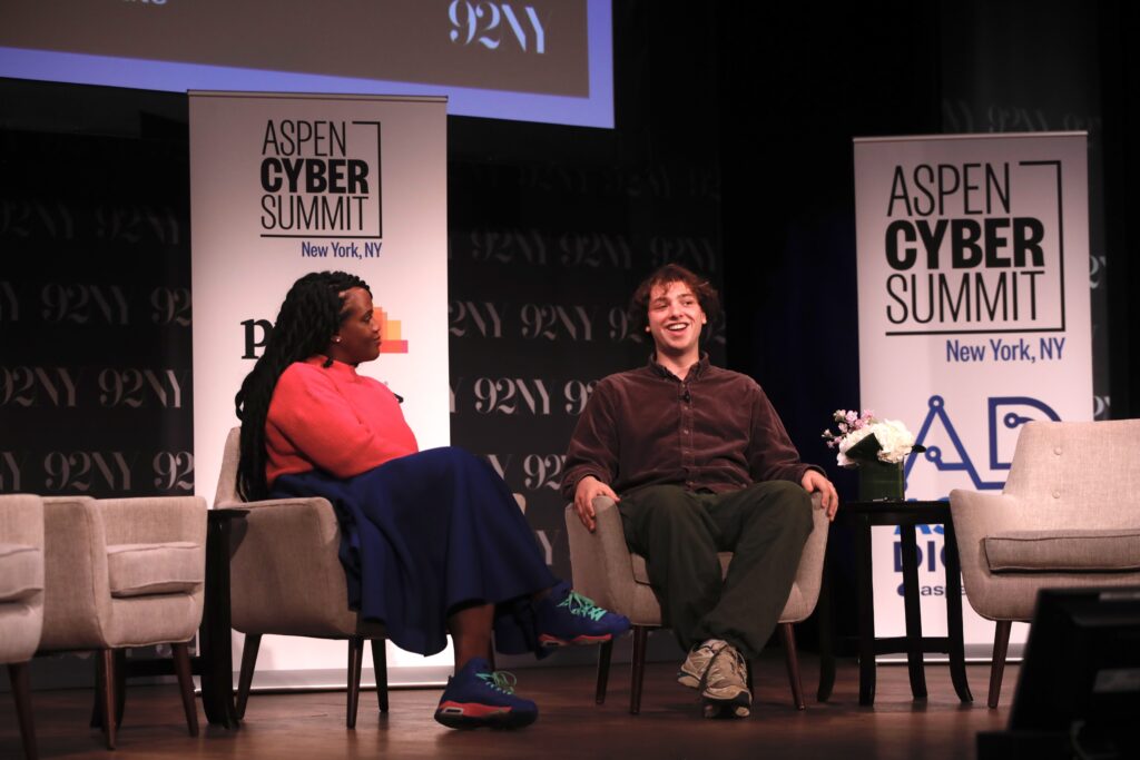 Peter McIndoe on stage at the 2023 Aspen Cyber Summit with Nicole Tisdale.