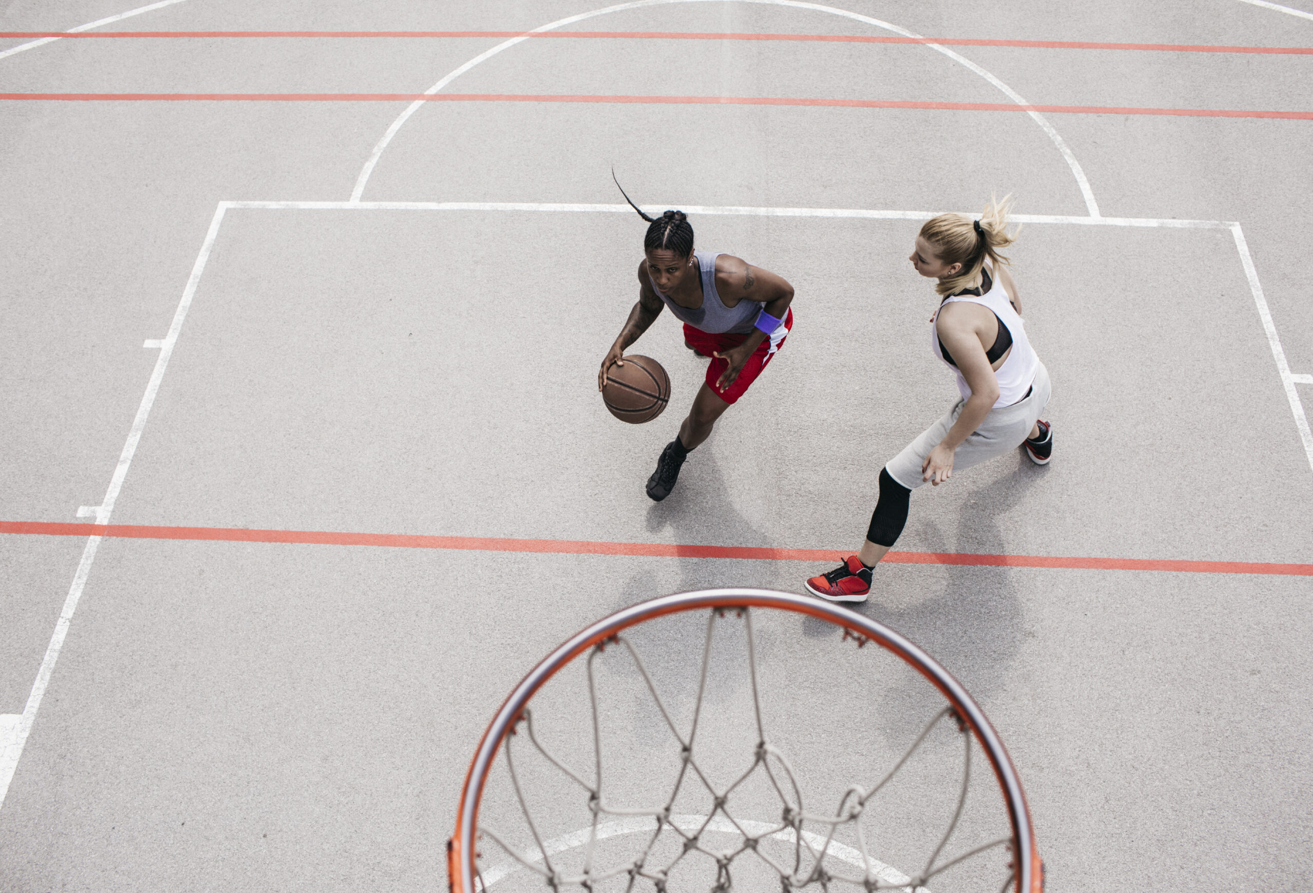 Two basketball players pivot around one another to line up a shot. It represents a strategic reorientation on AI competition with China.