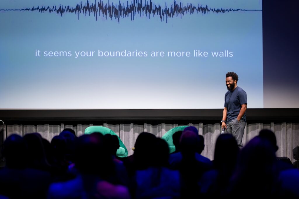Baratunde Thurston on stage at Shared Futures.
