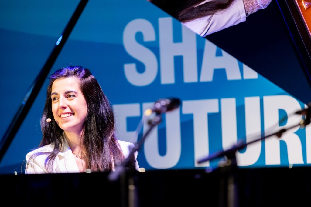 Ayşedeniz Gökçin on stage at Shared Futures.