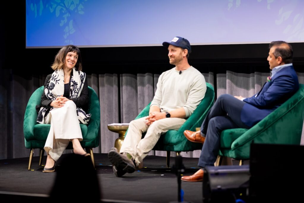 Panelists on stage at Shared Futures.