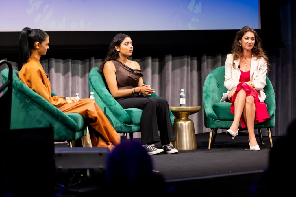 Panelists on stage at Shared Futures.