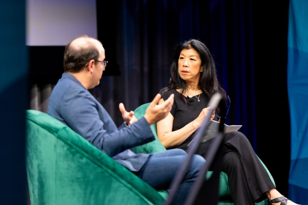 Ben Buchanan and Cecilia Kang on stage at Shared Futures.