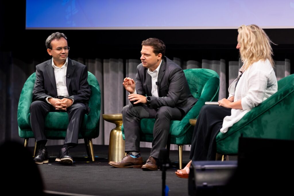 Panelists on stage at Shared Futures.