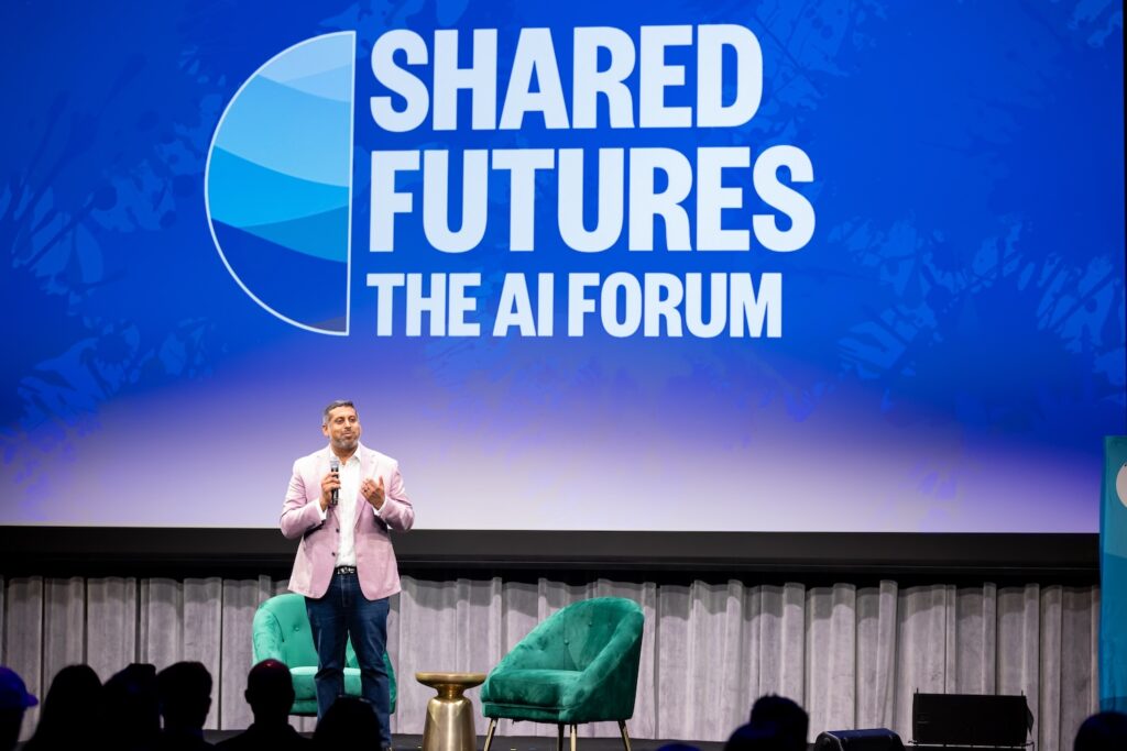 Vilas Dhar on stage at Shared Futures.
