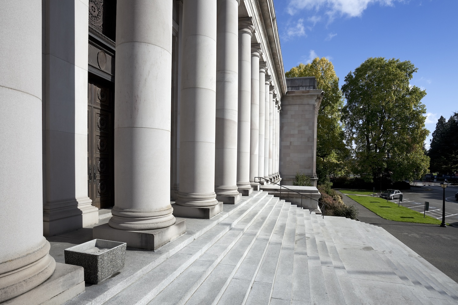 An up-close photo of steps leading up to a government building.