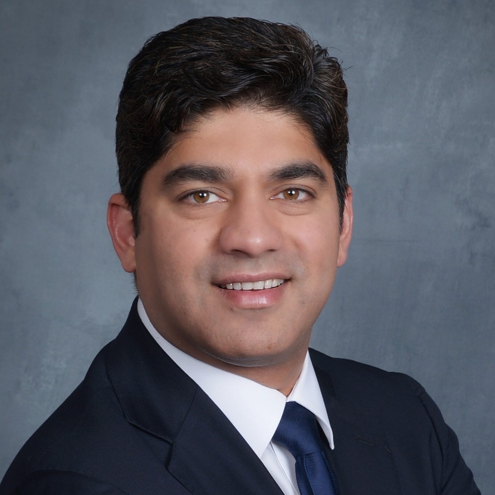 Rohan Sharma's headshot.