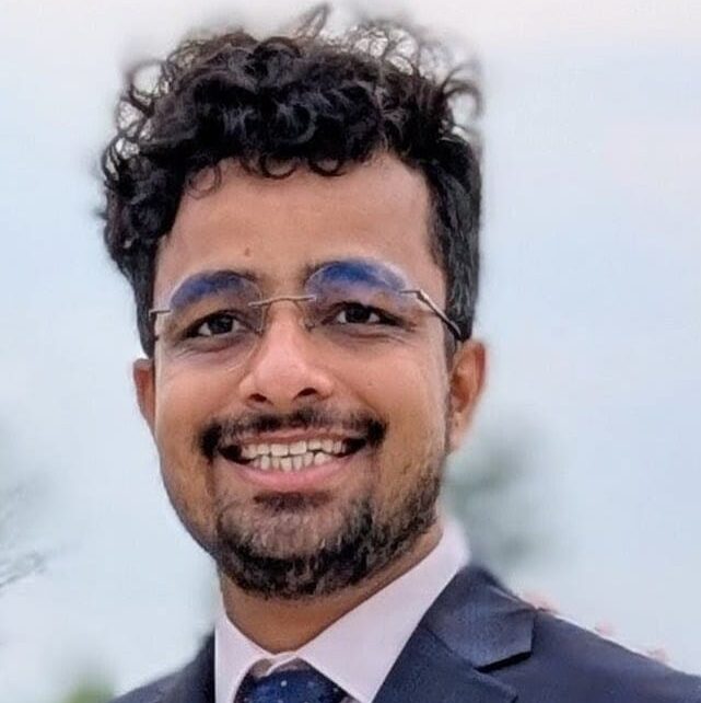 Ishu Gupta's headshot.