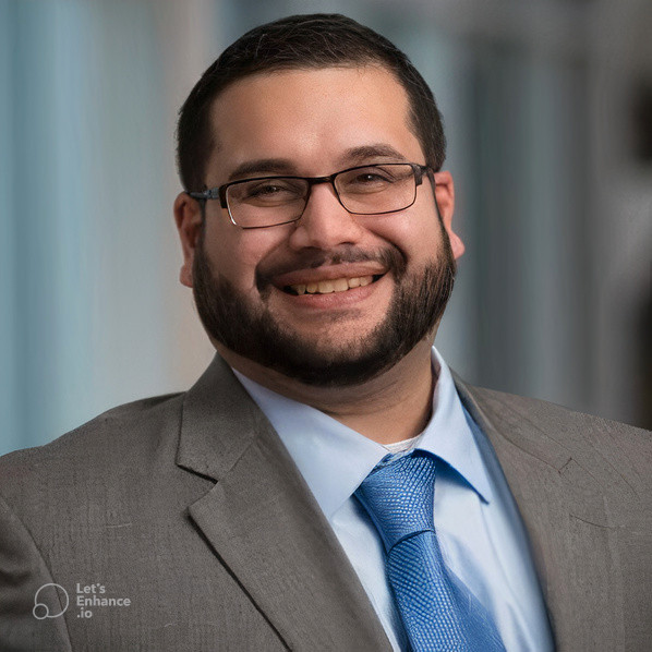 Ricky Santiago's headshot.